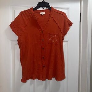 Umgee Short Sleeve Button-Up Top in Rust Orange with Star Pocket